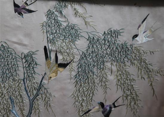 A Chinese Hundred Birds embroidered four-fold screen, early 20th century